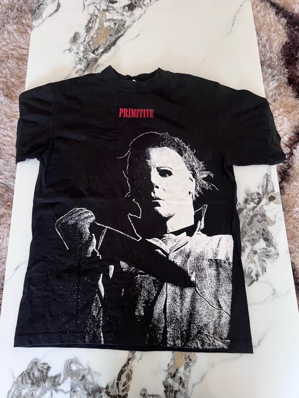 Primitive Black Short Sleeve Tee with White Michael Myers Graphic and Red Logo